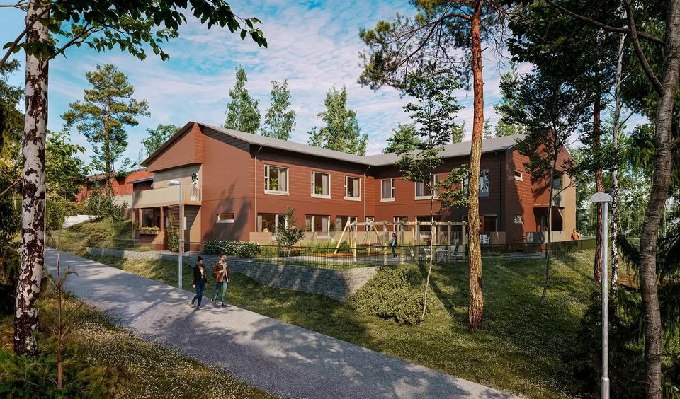 Havainnekuva punaruskeasta kaksikerroksisesta hirsirakennuksesta, mäntyjä etualalla